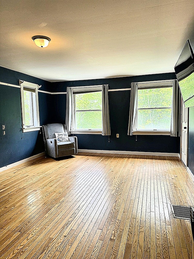 491 W Main St, Waldoboro, ME 04572 - unfurnished room featuring light wood finished floors, healthy amount of natural light, and baseboards