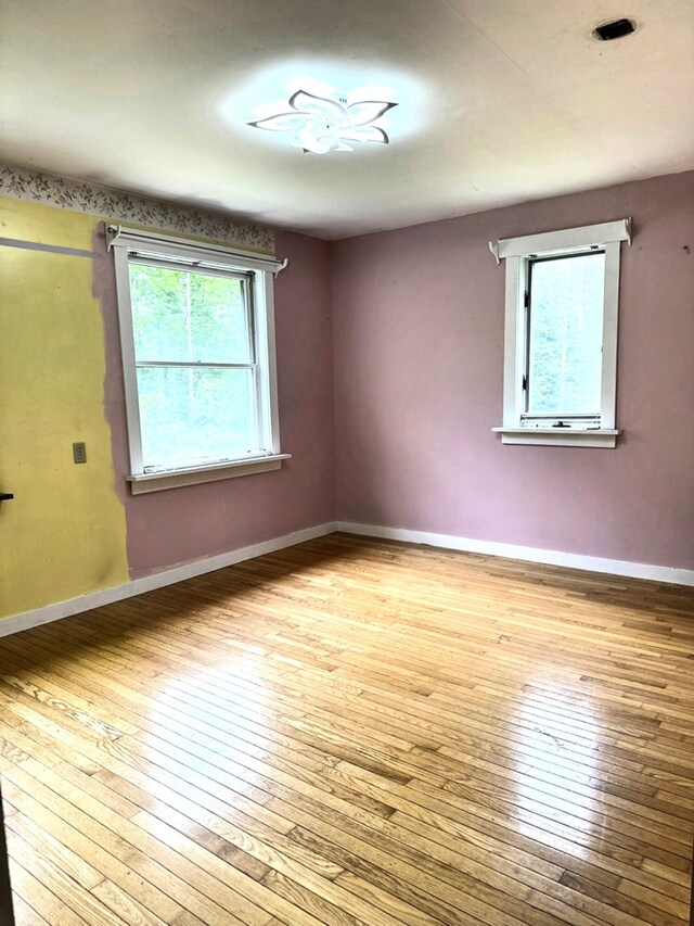 491 W Main St, Waldoboro, ME 04572 - empty room with hardwood / wood-style floors and baseboards