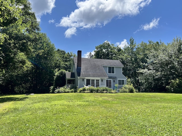 exterior space with a front lawn