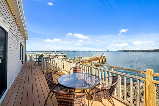 deck featuring a water view