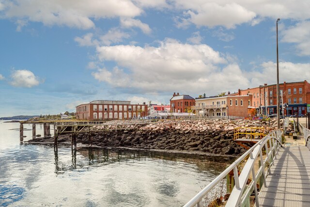 view of dock with a water view