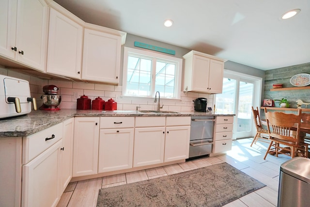 428 Main St, Orono, ME 04473 - kitchen featuring a sink, dishwasher, healthy amount of natural light, tasteful backsplash, and recessed lighting