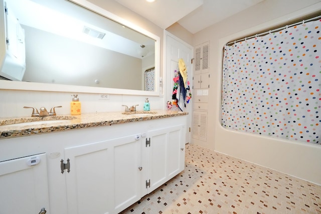 428 Main St, Orono, ME 04473 - bathroom with double vanity and shower / bath combo