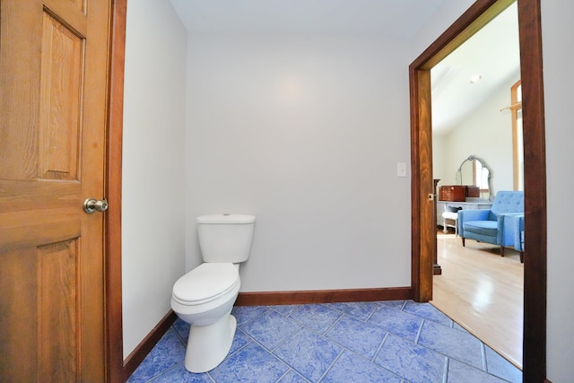 428 Main St, Orono, ME 04473 - bathroom featuring toilet and baseboards