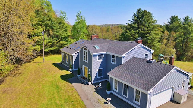428 Main St, Orono, ME 04473 - aerial view of property and surrounding area with a heavily wooded area
