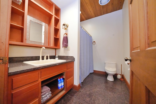 428 Main St, Orono, ME 04473 - bathroom with toilet, baseboards, vanity, wood ceiling, and curtained shower