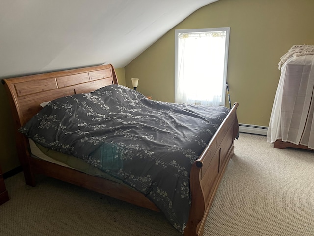 bedroom featuring light carpet, vaulted ceiling, and baseboard heating