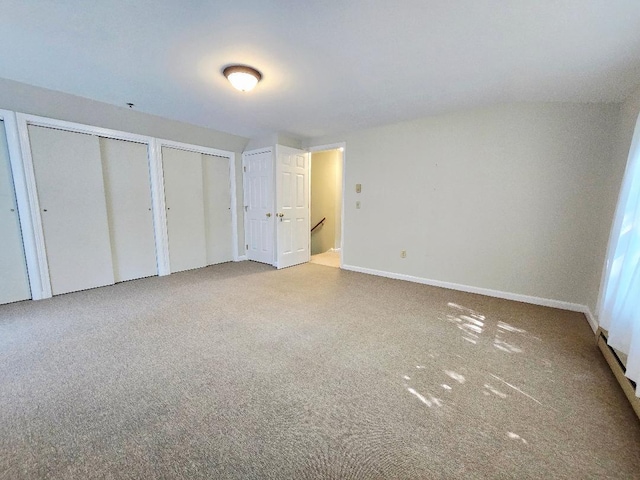 40 Willow Grove Rd, Brunswick, ME 04011 - unfurnished bedroom featuring two closets and carpet