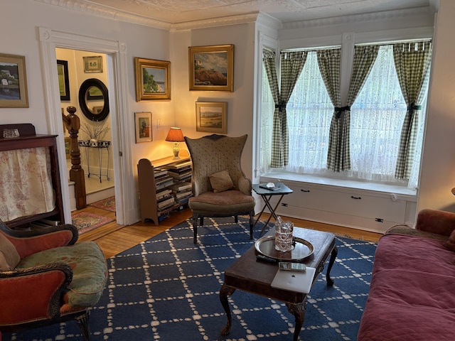 24 Glidden St, Waldoboro, ME 04572 - sitting room featuring wood finished floors and crown molding