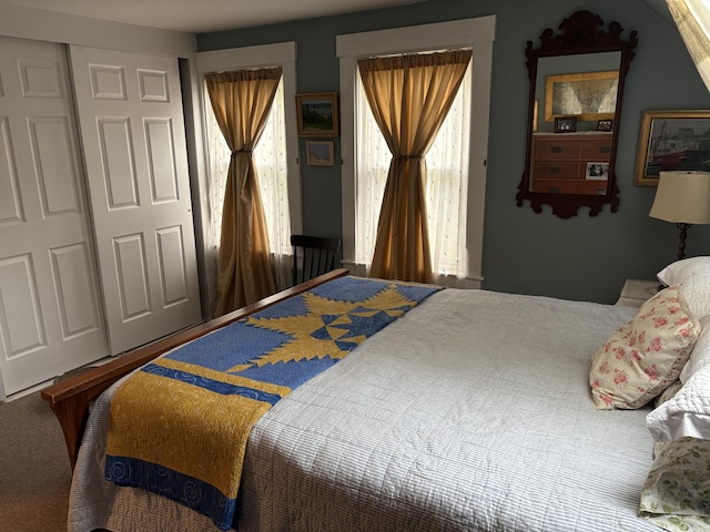 24 Glidden St, Waldoboro, ME 04572 - carpeted bedroom featuring multiple windows and a closet