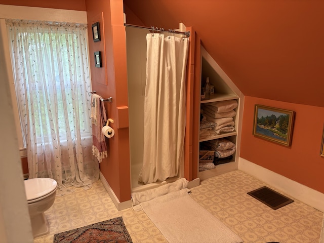 24 Glidden St, Waldoboro, ME 04572 - full bathroom with toilet, a shower with curtain, and tile patterned floors