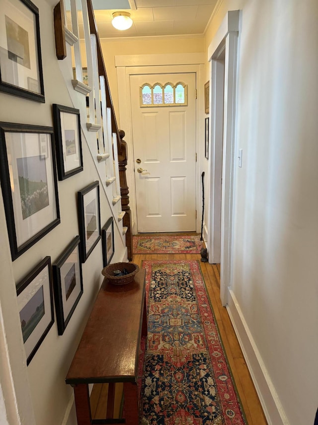 24 Glidden St, Waldoboro, ME 04572 - doorway to outside with stairway, light wood-style floors, and baseboards