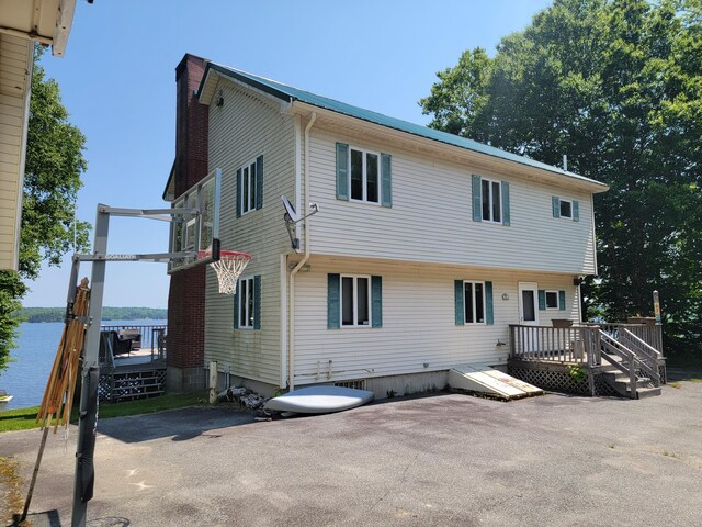 exterior space with a deck and a patio