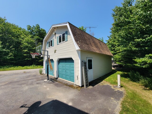 view of home's exterior with a garage