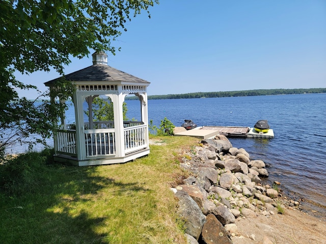 exterior space with a gazebo and a dock