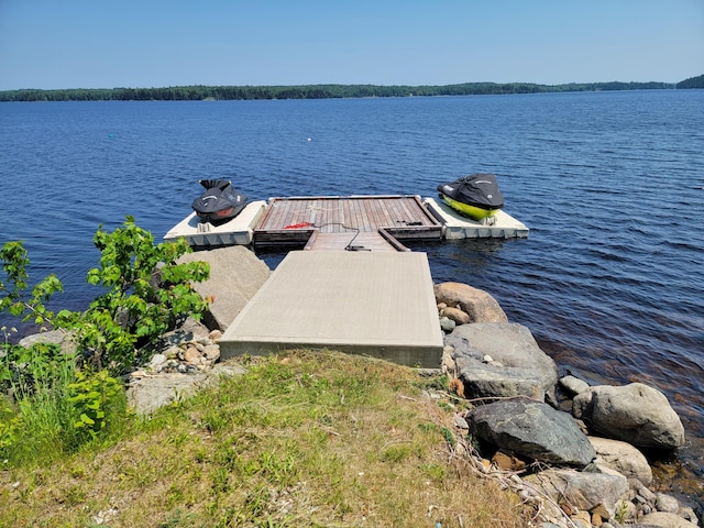 dock area featuring a water view