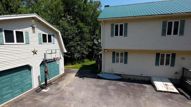 view of home's exterior featuring a garage