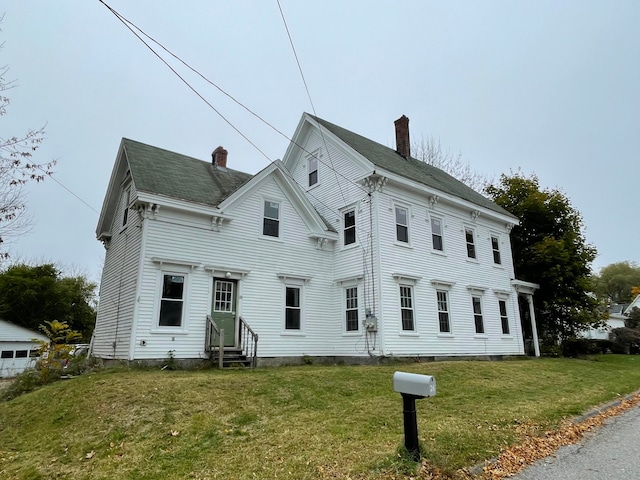 exterior space featuring a lawn