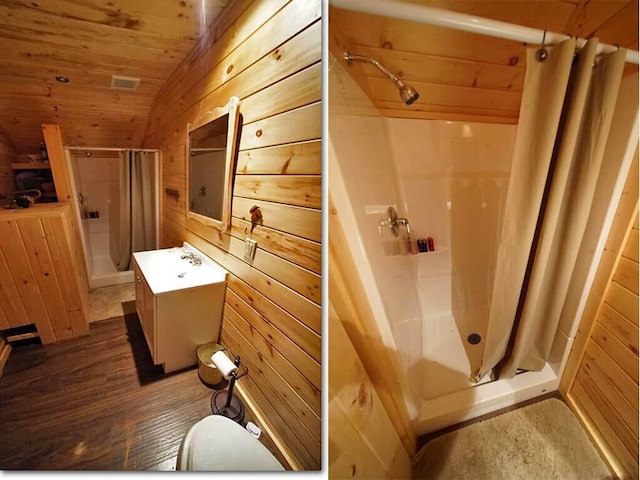 bathroom featuring wooden ceiling, wooden walls, wood-type flooring, walk in shower, and vaulted ceiling