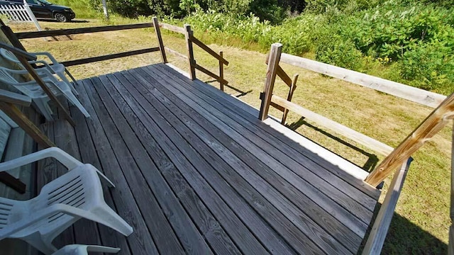 deck featuring a yard