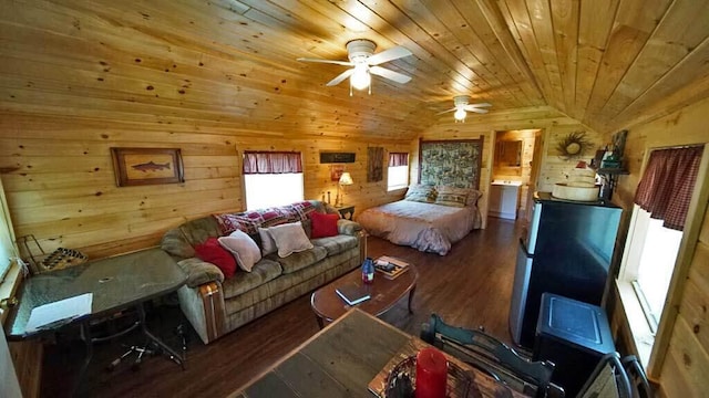 living room featuring lofted ceiling, dark hardwood / wood-style floors, ceiling fan, wood walls, and wood ceiling