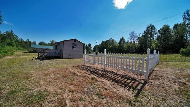 view of yard featuring a deck