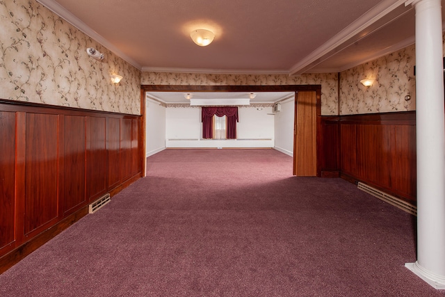 basement with crown molding and dark carpet