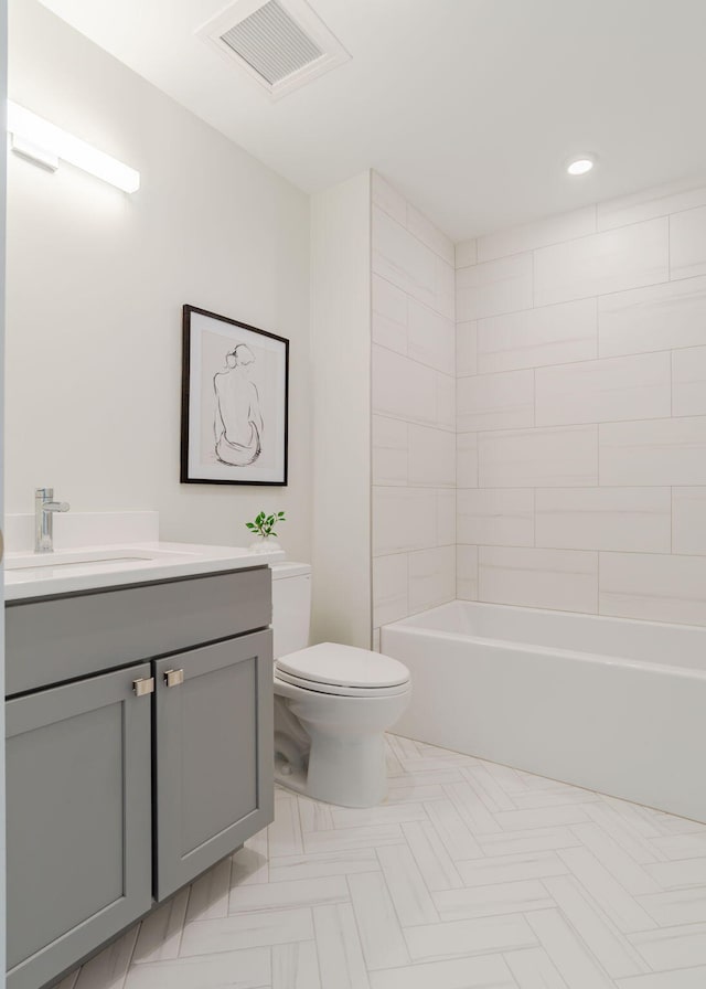 full bath featuring vanity, shower / bath combination, toilet, visible vents, and recessed lighting