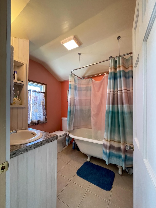 full bathroom featuring tile flooring, toilet, vanity, shower / bathtub combination with curtain, and vaulted ceiling