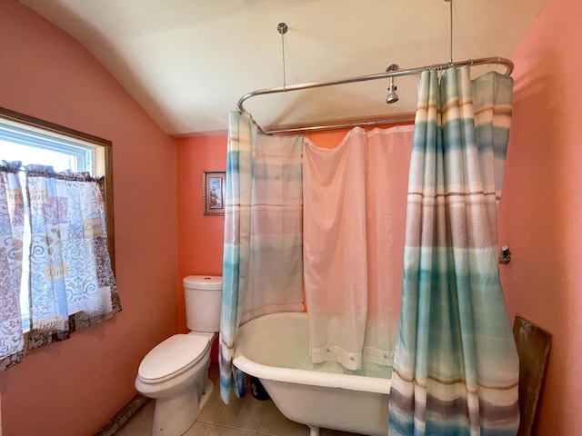 bathroom with shower / tub combo, lofted ceiling, tile flooring, and toilet