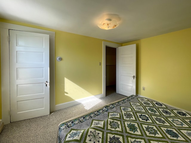 bedroom featuring dark carpet