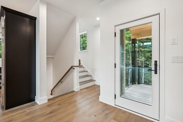 doorway to outside featuring light hardwood / wood-style flooring