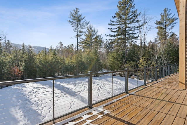 wooden terrace with a mountain view