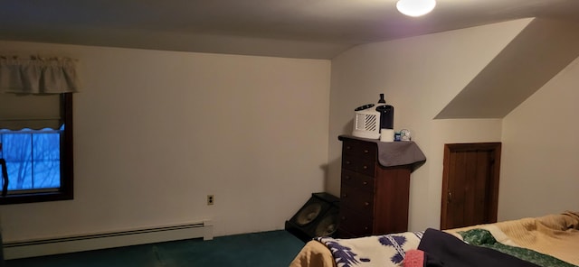 bedroom featuring vaulted ceiling and baseboard heating