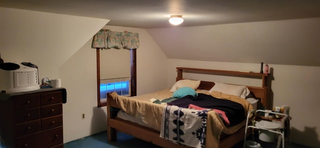 bedroom with lofted ceiling