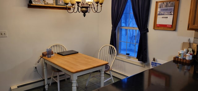 dining space featuring a chandelier and a baseboard radiator