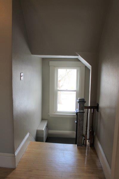 interior space with dark wood-type flooring