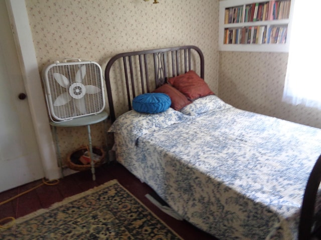 bedroom featuring wallpapered walls