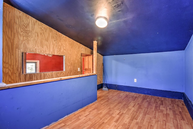 64 Ferrin Rd, Litchfield, ME 04350 - additional living space featuring baseboards, lofted ceiling, and wood finished floors