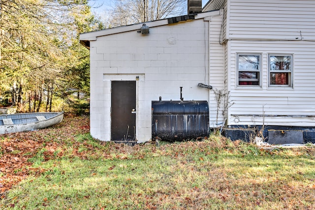 view of home's exterior with a yard