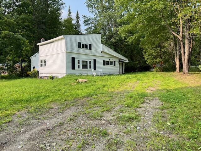 64 Ferrin Rd, Litchfield, ME 04350 - exterior space with a chimney