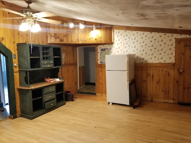 64 Ferrin Rd, Litchfield, ME 04350 - kitchen with a wainscoted wall, open shelves, freestanding refrigerator, light wood-type flooring, and ceiling fan