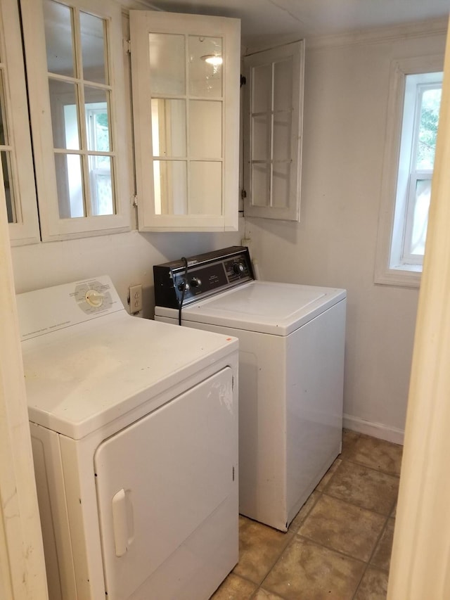 laundry room with washing machine and dryer