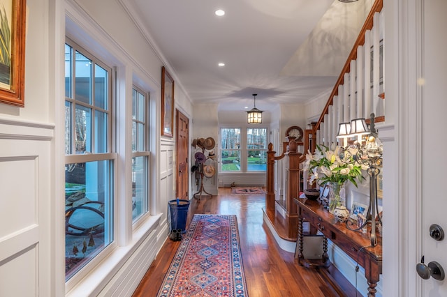 29 Summerhaven Ln, Boothbay, ME 04544 - hallway featuring stairs, dark wood-style flooring, recessed lighting, and ornamental molding