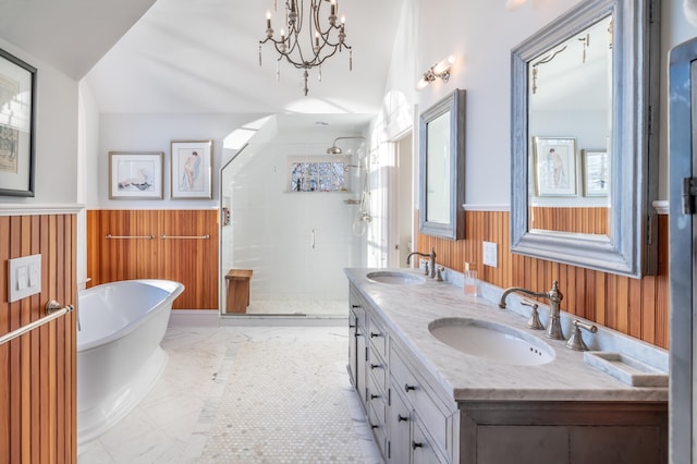 29 Summerhaven Ln, Boothbay, ME 04544 - full bathroom with wainscoting, a stall shower, double vanity, a freestanding bath, and wooden walls
