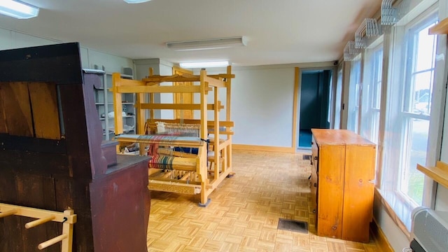 kitchen with light parquet flooring and wooden counters