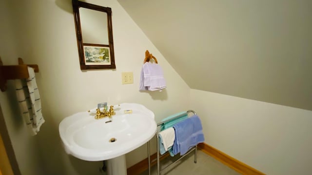 bathroom featuring tile flooring and sink