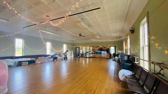 interior space with hardwood / wood-style floors and ceiling fan