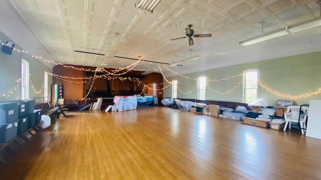 interior space with ceiling fan and hardwood / wood-style flooring