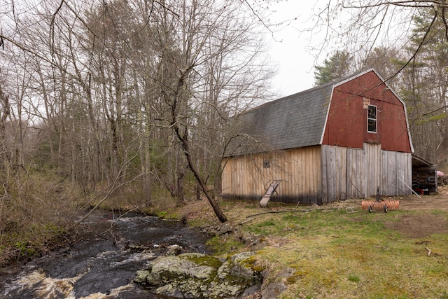 view of side of property featuring a water view